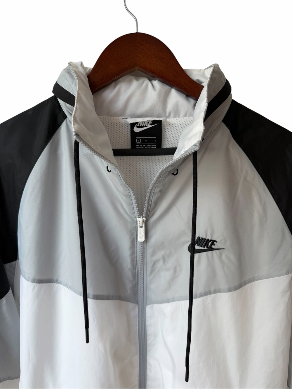 Nike sports jacket with stow away hood size large